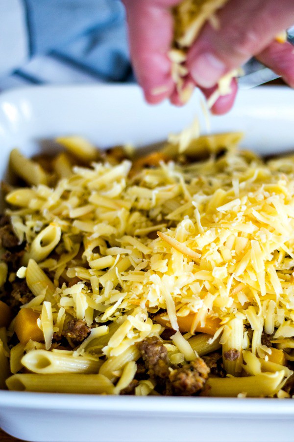 Butternut Squash Italian Sausage Pasta Bake with shredded smoked gouda cheese