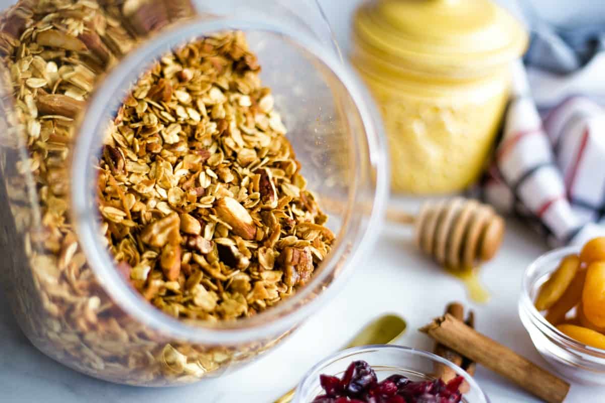 Homemade granola with nuts stored in an air-tight container.