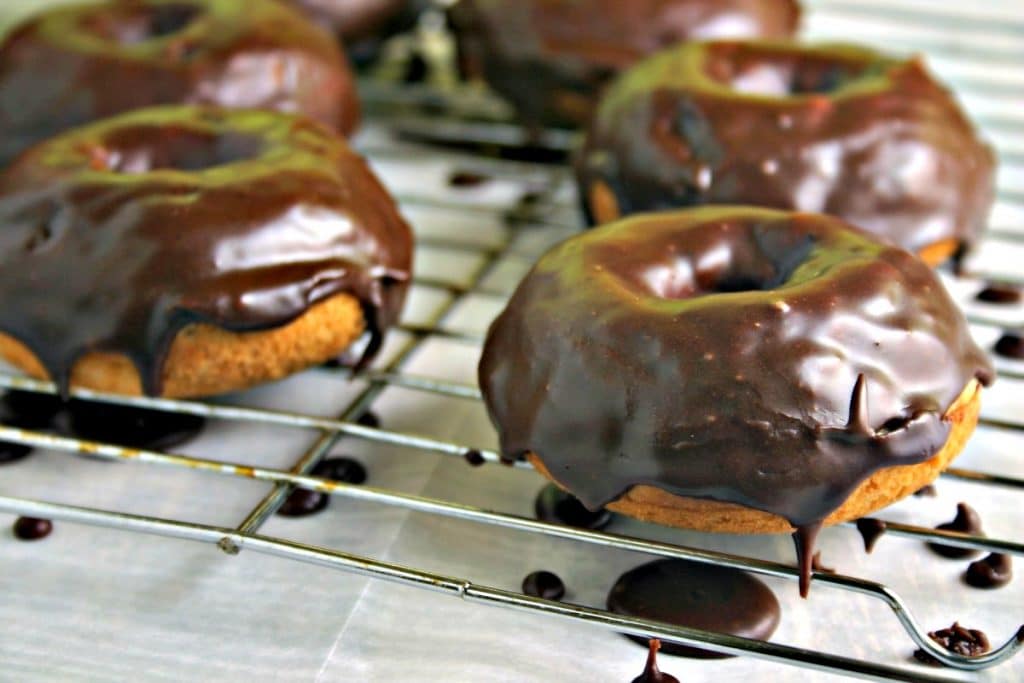 A chocolate covered donut, with Mocha Glazed Baked Donuts