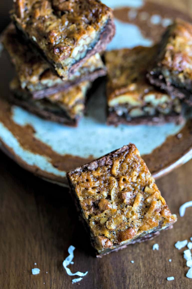 a place of bar cookies with a crunchy pecan topping