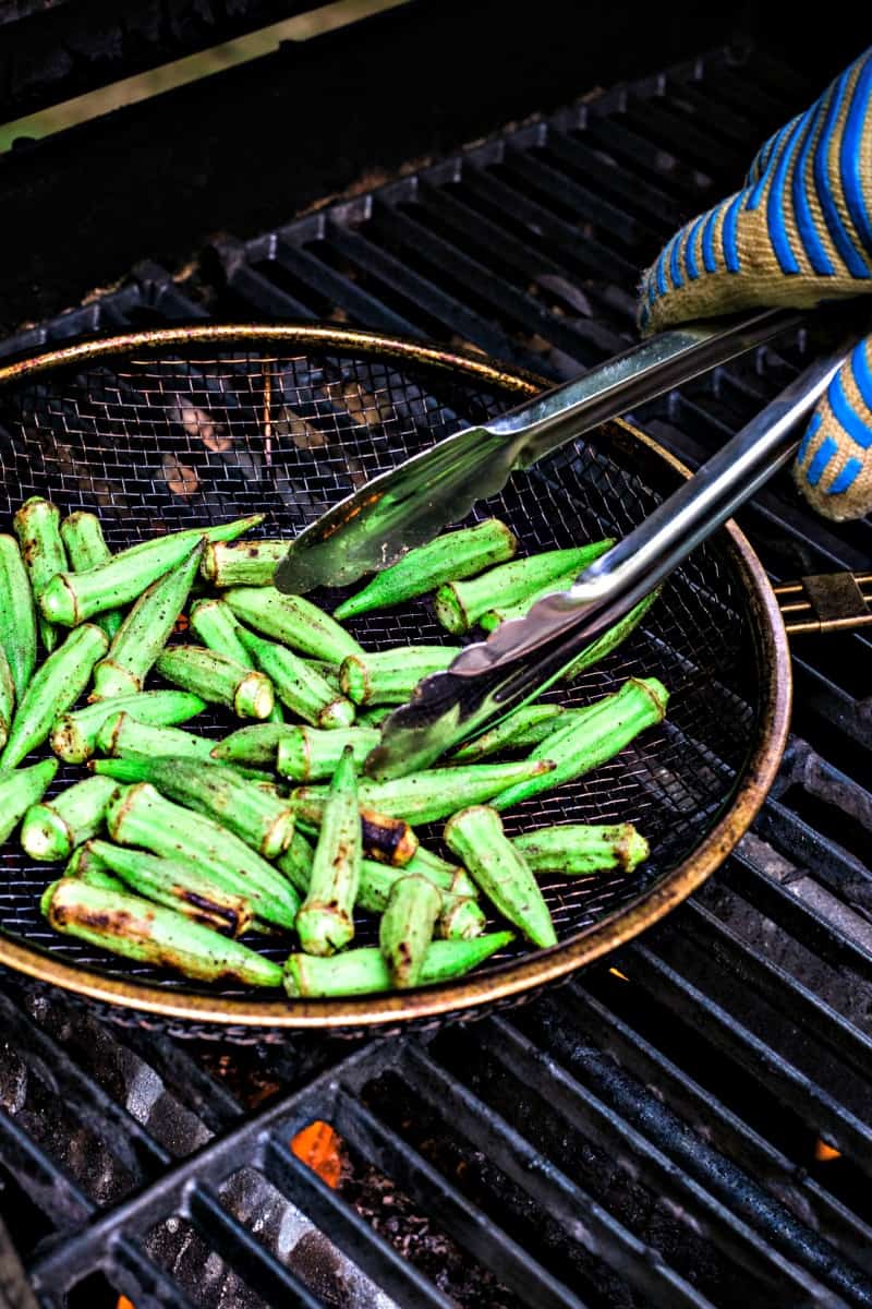 A pan of food on a grill, with Okra 