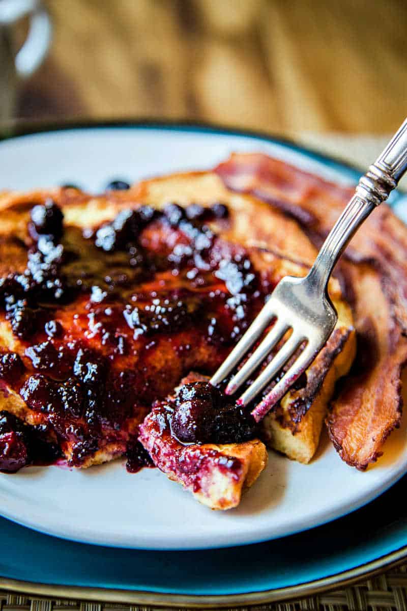 a bite of french toast on a fork