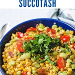 a blue bowl filled with corn succotash.