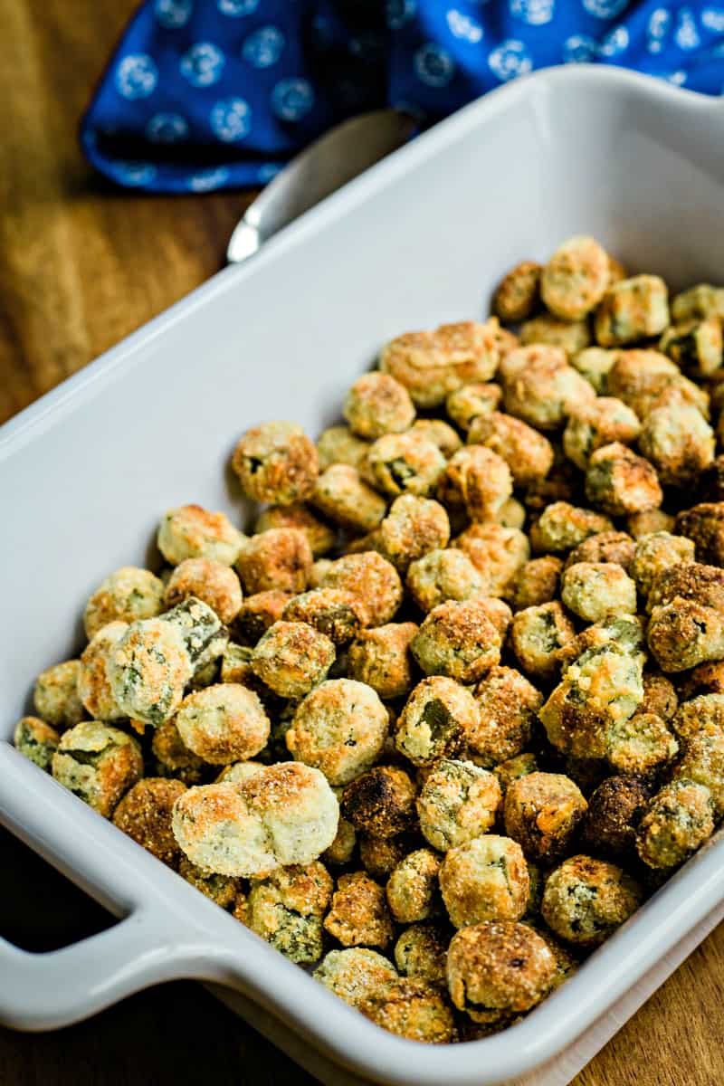 oven fried okra in a white baking dish
