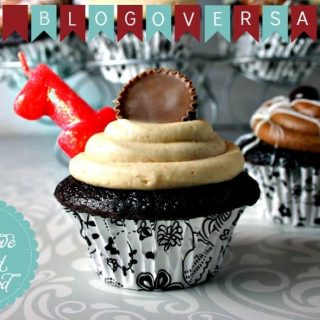 A large chocolate cupcake sitting on top of a table