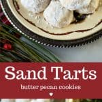 a plate of Sand Tart cookies on a Christmas plate and plaid table runner