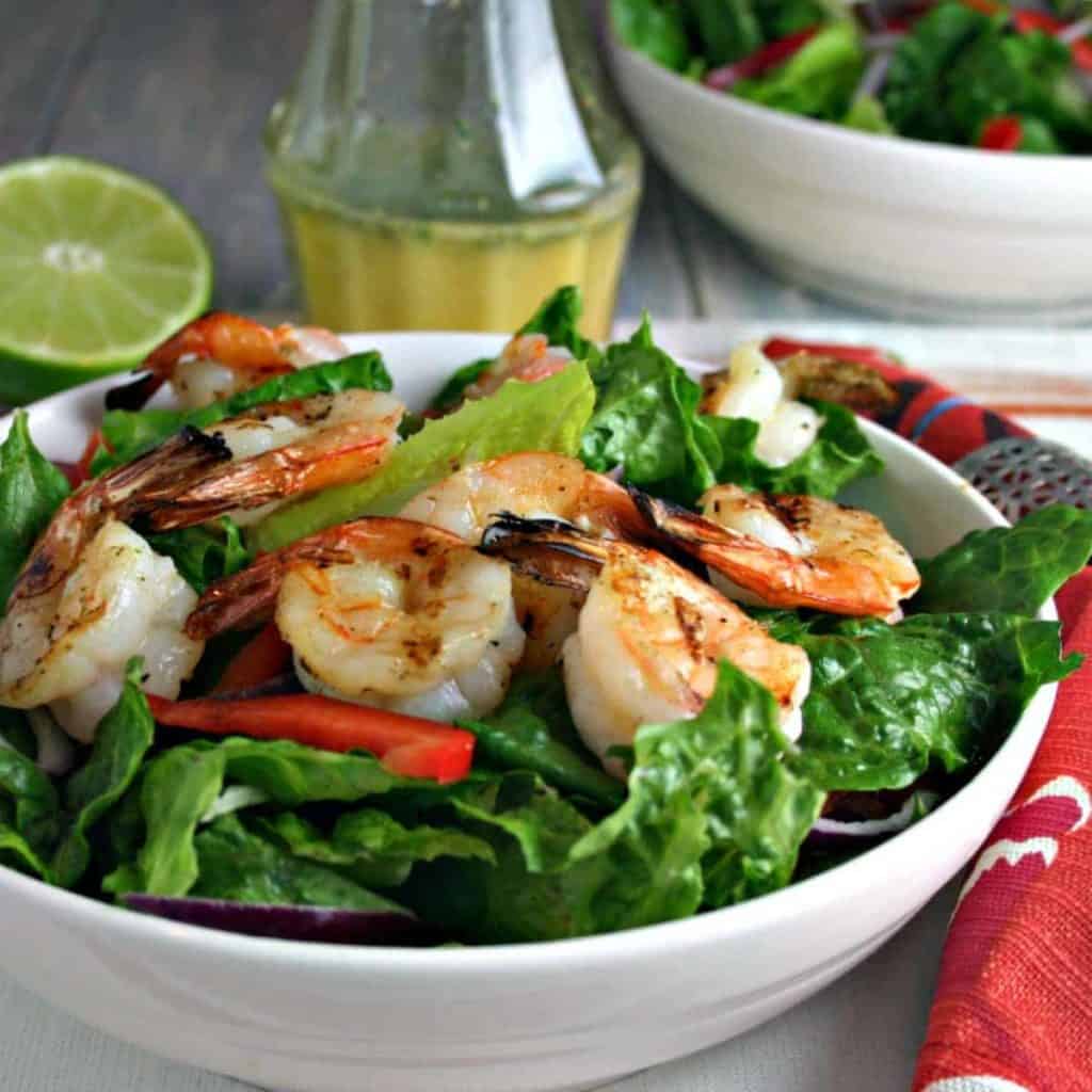 A bowl of salad, with Citrus Grilled Shrimp Salad