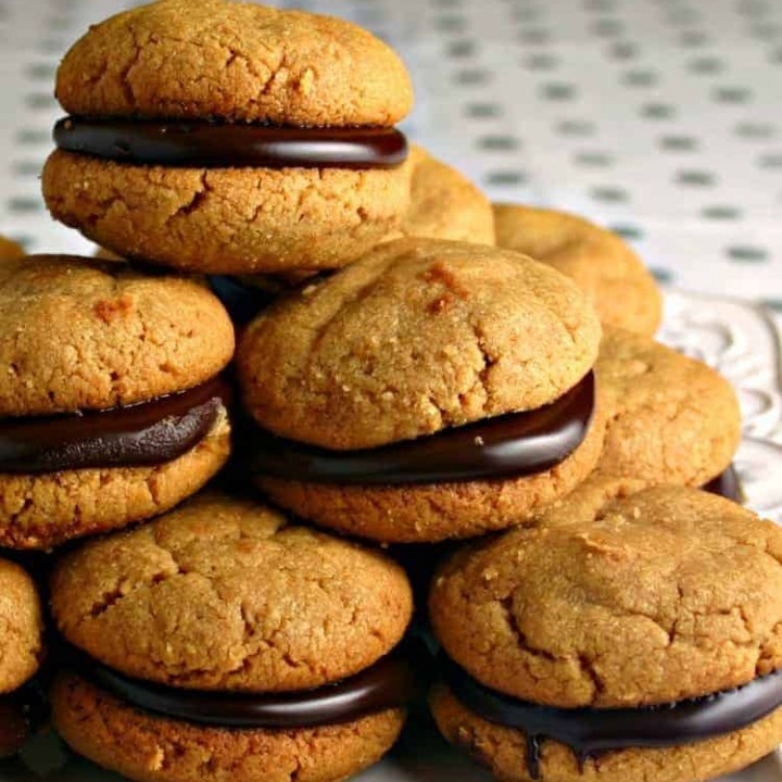 Food on a plate, with flourless peanut butter and Chocolate sandwich cookies
