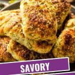 savory ricotta scones stacked on a plate