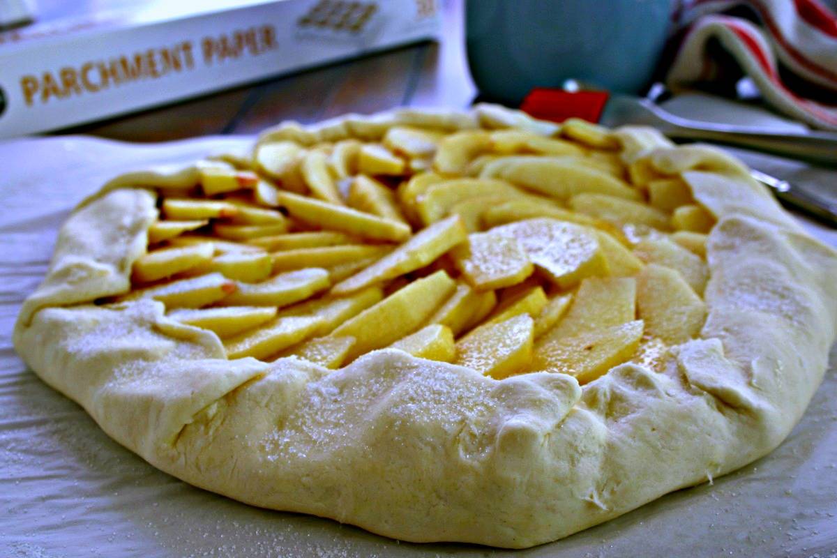 Pastry dough filled with apple slices, with Rustic Apple Tart