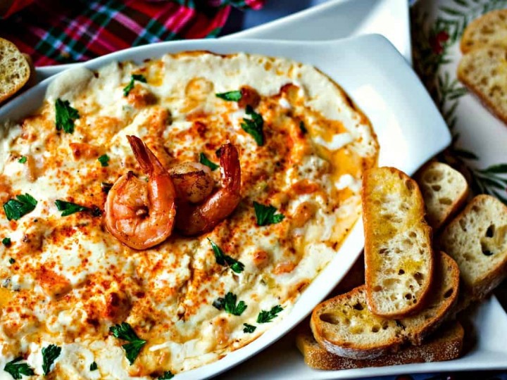 Cheesy Shrimp Dip in white baking dish