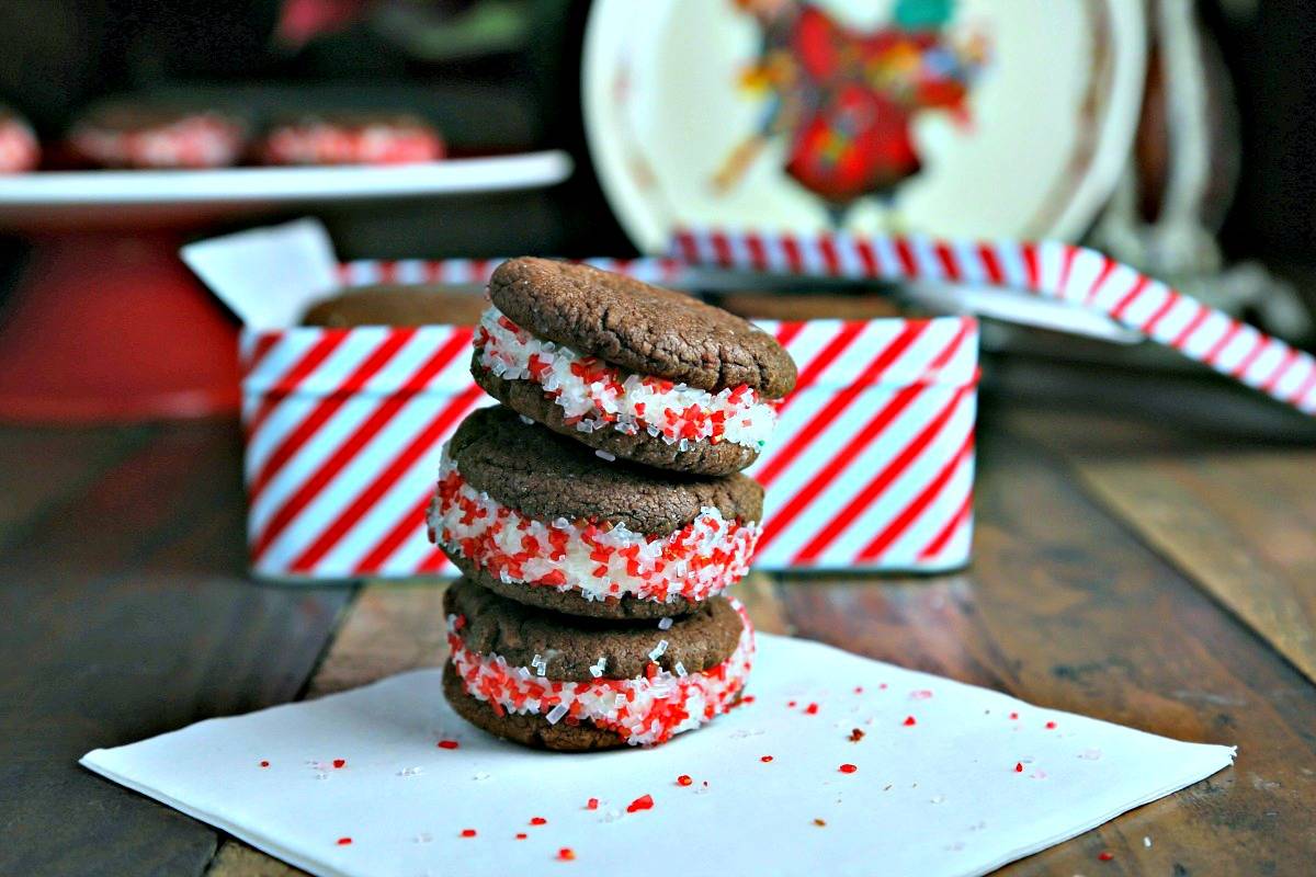 A close up of a stack of Homemade Peppermint Oreos sitting on top of a table