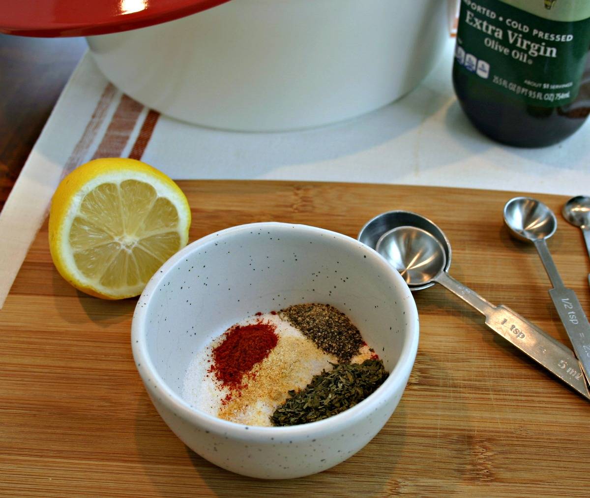 A bowl of spices on a table, with Sweet Basil Roasted Chicken