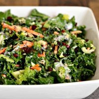 A close up of a bowl of salad, with Poppy Seed Kale Salad