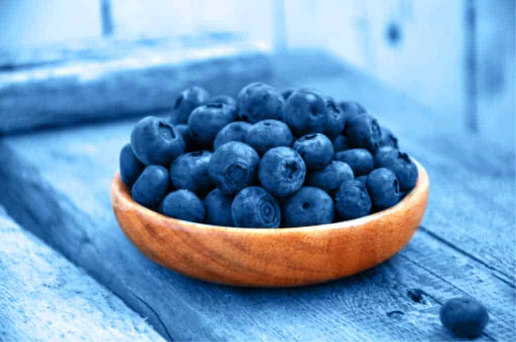 blueberries in a wooden bowl