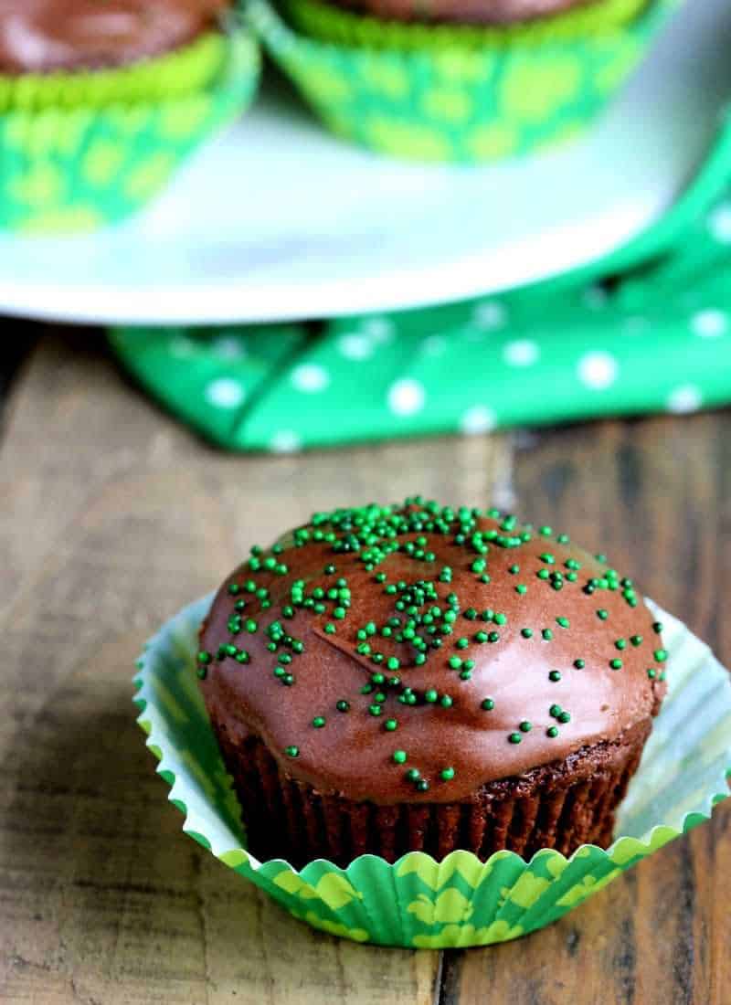 Mint Cream Filled Chocolate Cupcakes in a shamrock paper liner 