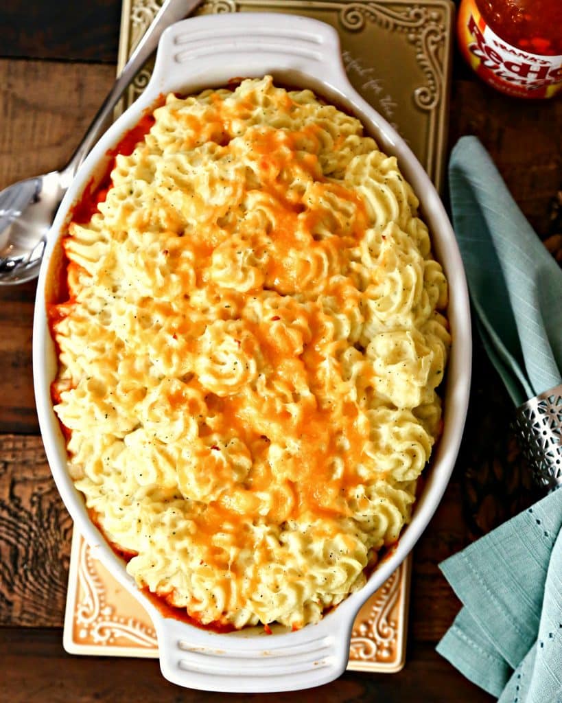 A casserole dish of Buffalo Chicken Shepherd's pie on a table