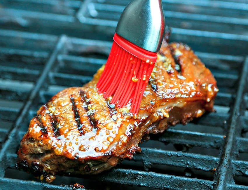 A close up of a steak on a grill