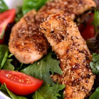 A plate of food with Sesame Chicken Salad