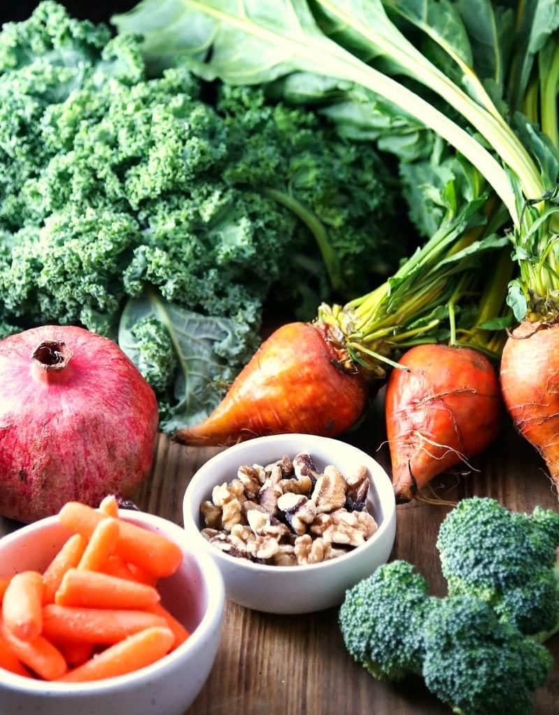 A bunch of vegetables on a cutting board