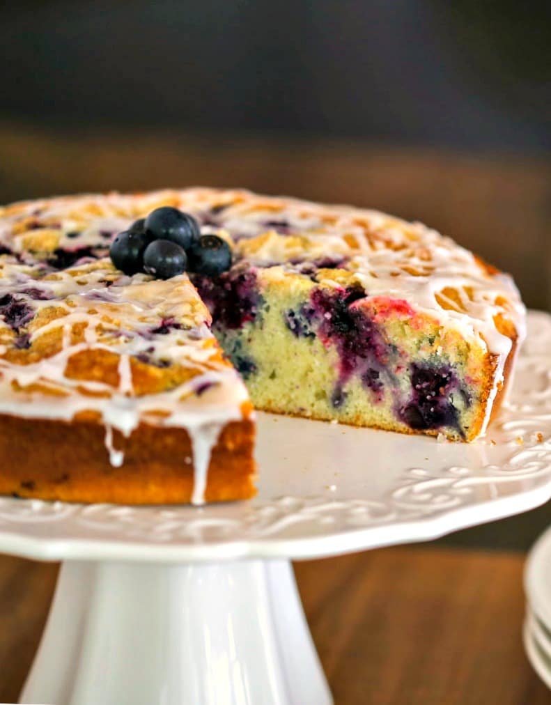 Blueberry Coffee Cake on a white cake stand