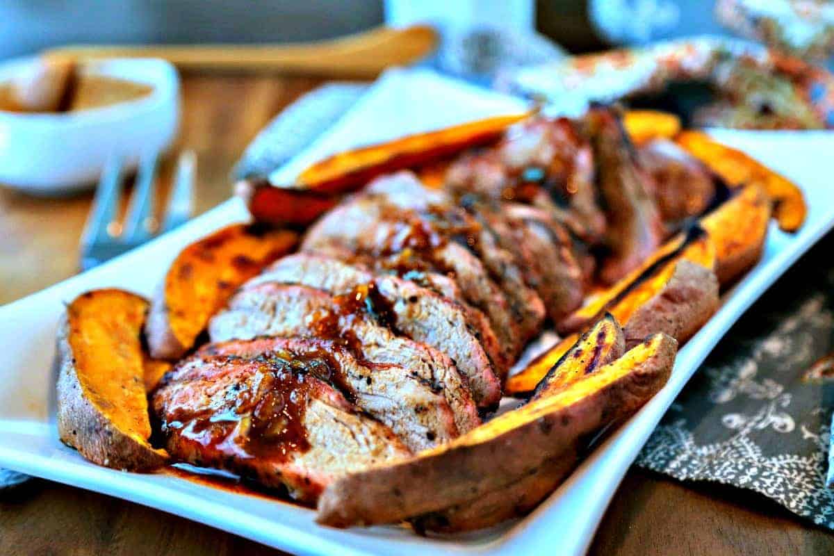 A plate of sliced Chili-Orange Glazed Pork Tenderloin