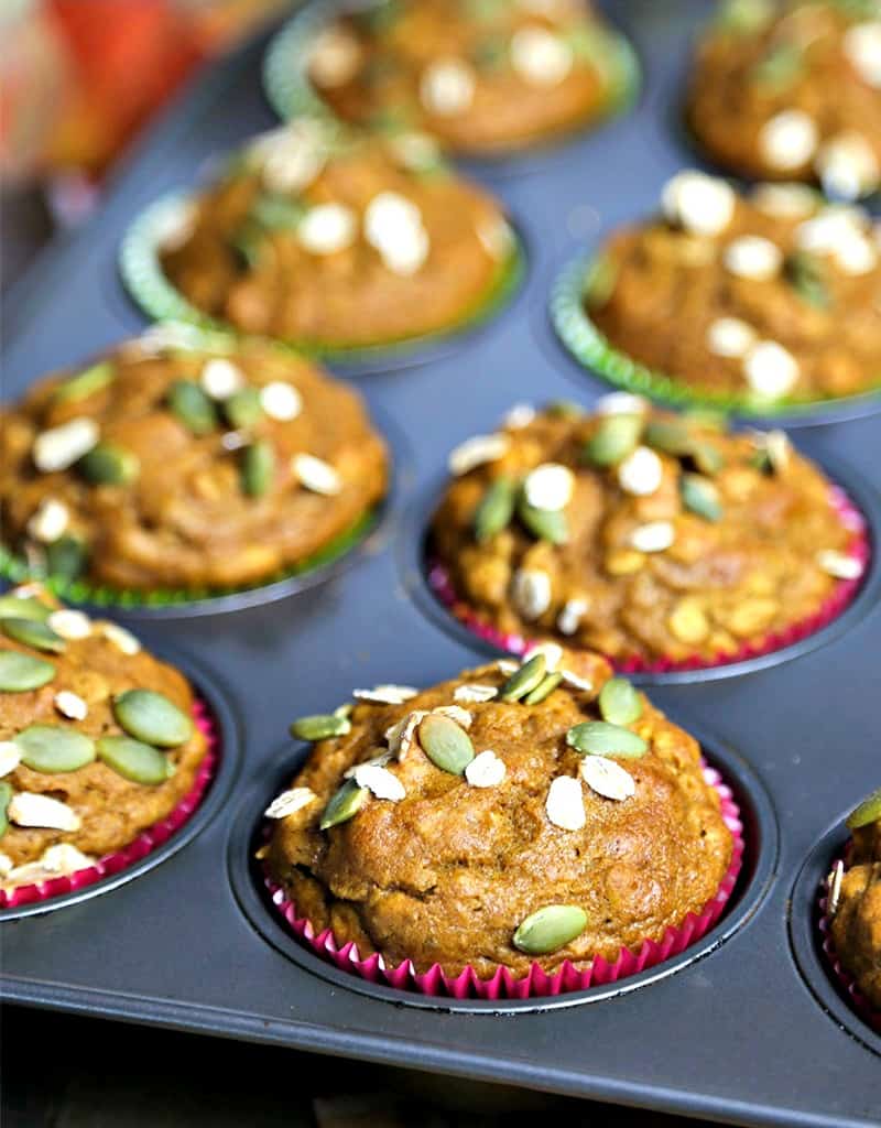 Pumpkin Oat Muffins in paper liners in a muffin pan