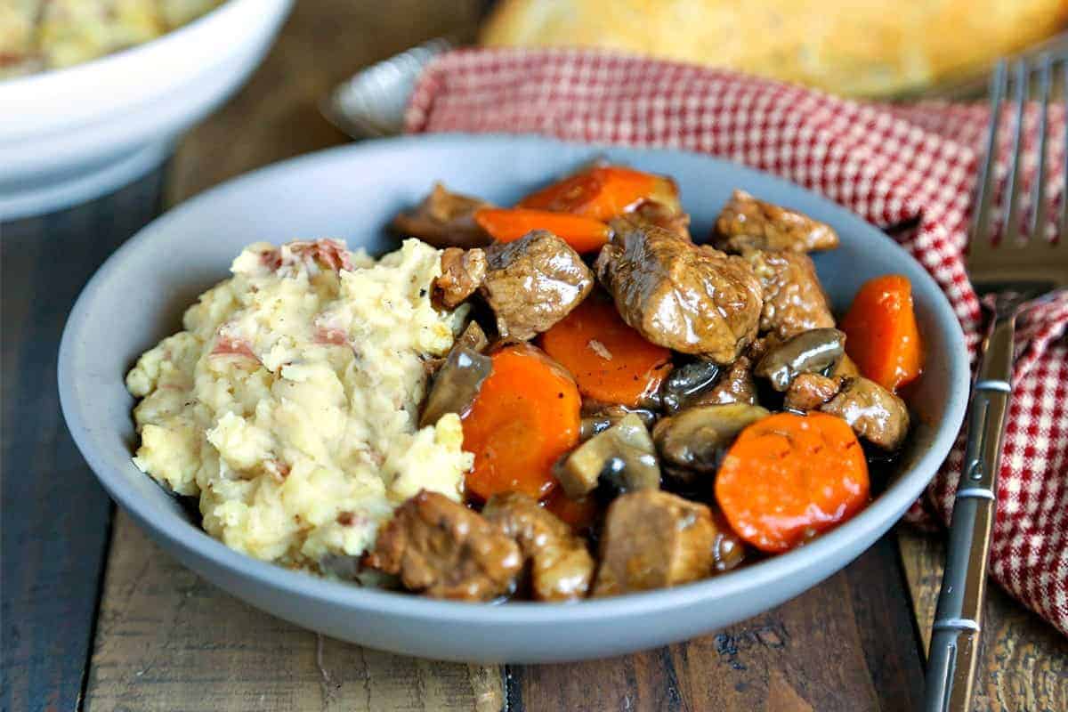 Marsala Beef Stew with Redskin Mashed Potatoes in blue bowl