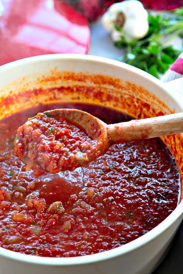 A close up of a pot of spaghetti sauce