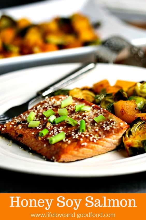Honey Soy Salmon Sheet Pan Dinner. A flavorful weeknight meal of Asian-inspired sweet, flaky salmon with crisp roasted Brussel sprouts and butternut squash. You'll love this good-for-you, easy-to-prepare 30-minute recipe!