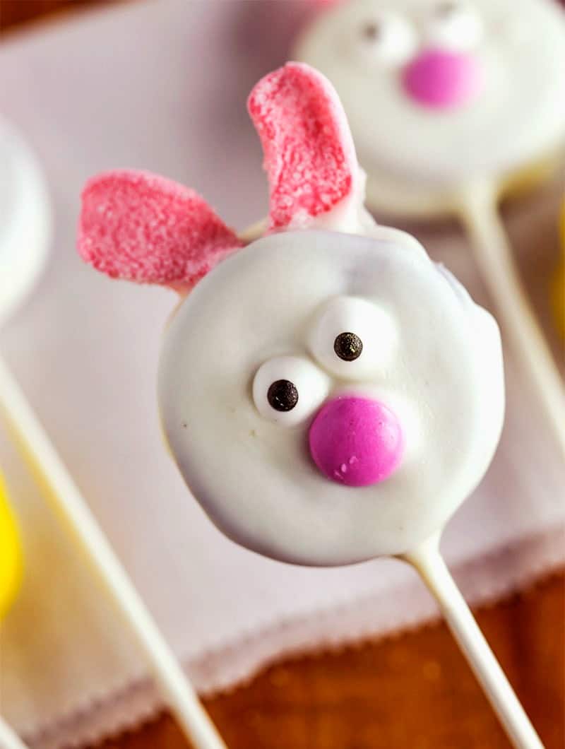 Chocolate covered oreo on a stick decorated like a bunny