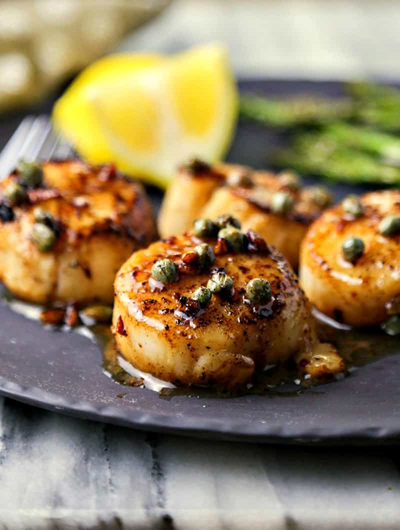A close up of food, with Brown Butter Scallops