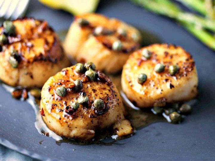 A plate of food, with Brown Butter Scallops