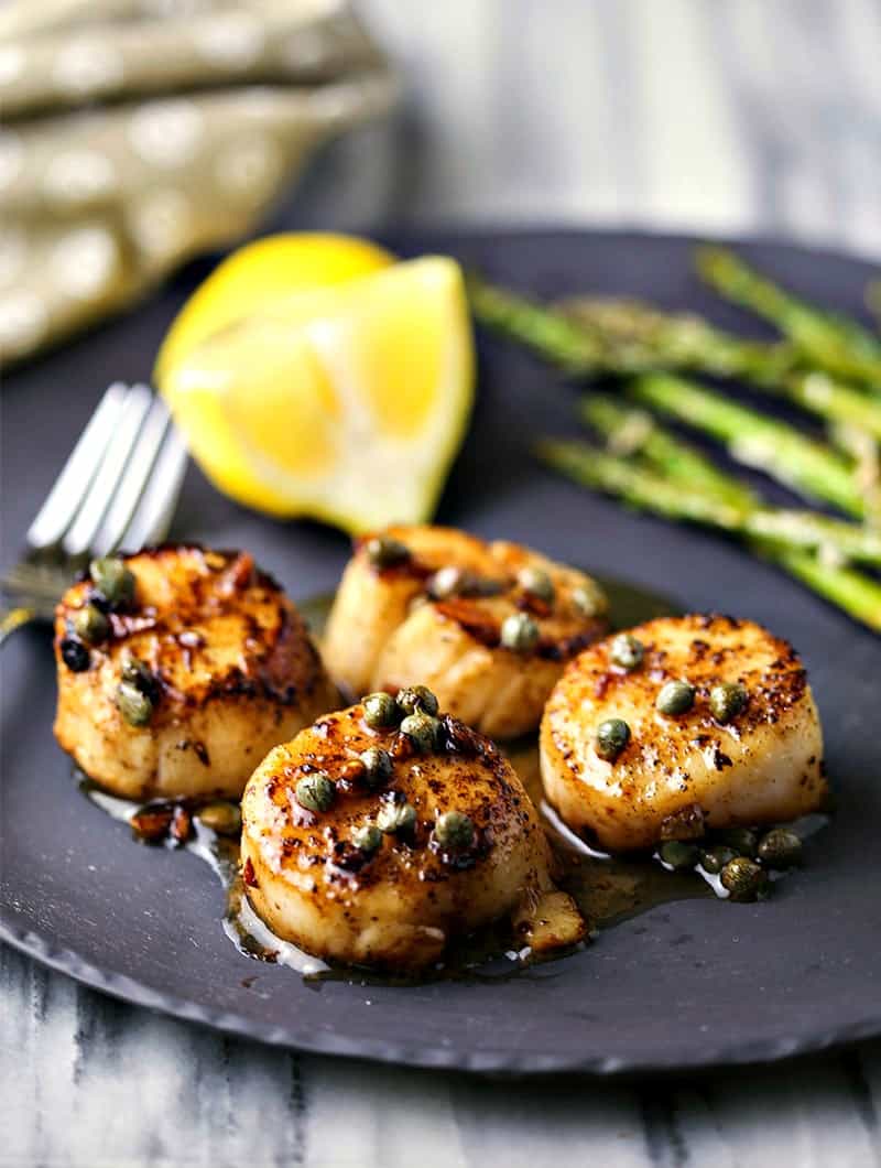 A plate of food, with Brown Butter Scallops