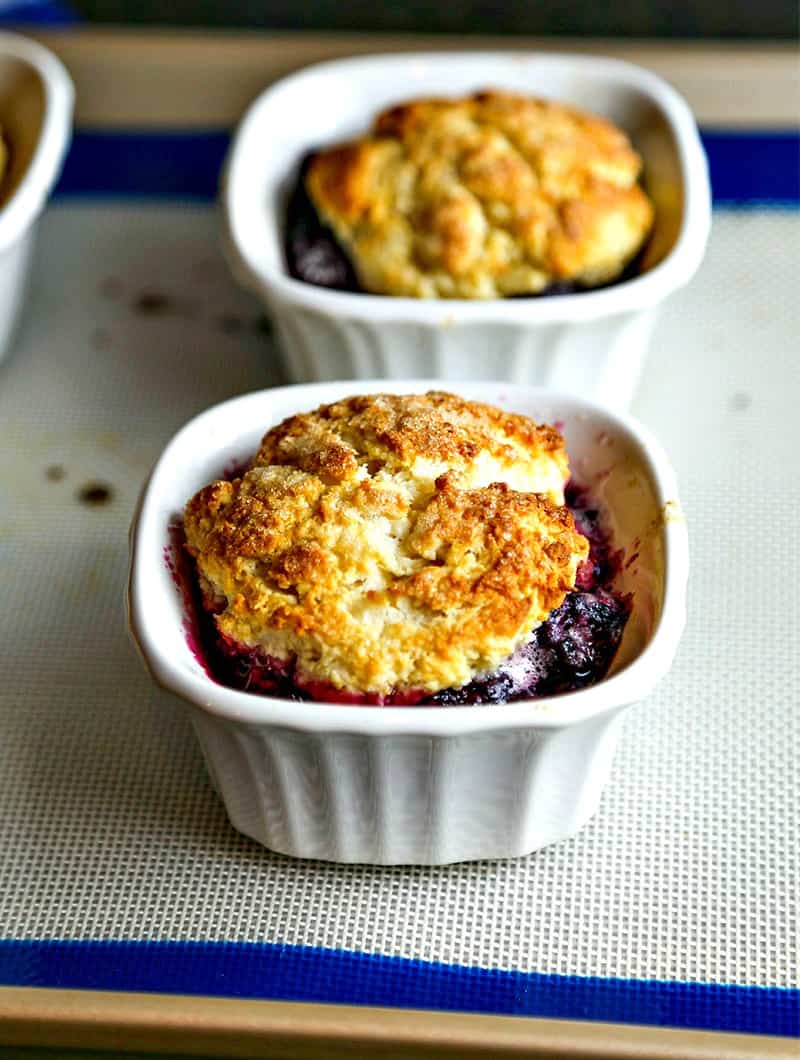 Mini Blackberry Cobblers on a baking sheet