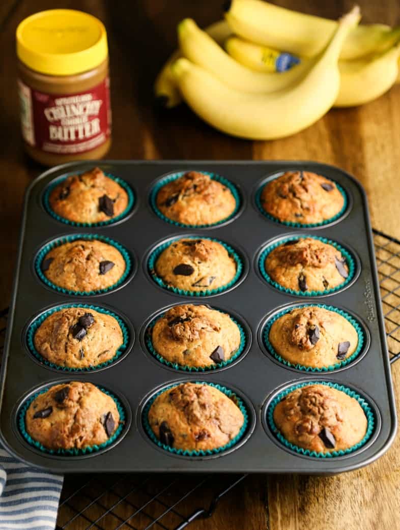 A close up of banana chocolate chunk cookie butter muffins