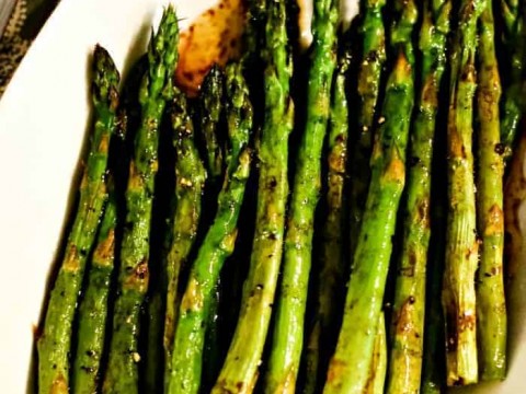 A plate of food, with asparagus