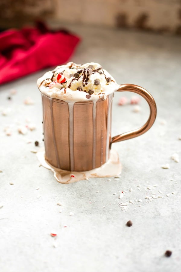 Dark chocolate peppermint mocha in a copper cup with whipped cream