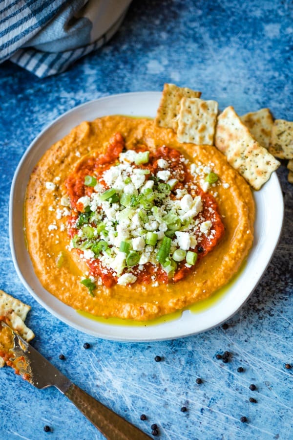 Sprinkle the hummus dip with Feta cheese or Blue cheese crumbles
