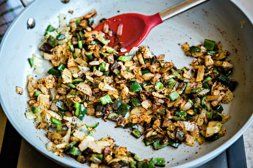 Chicken Black Bean Enchiladas with onions and poblano peppers