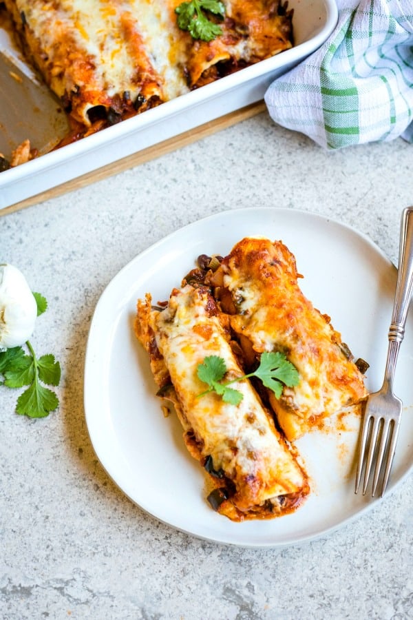 Chicken Black Bean Enchiladas on a white plate