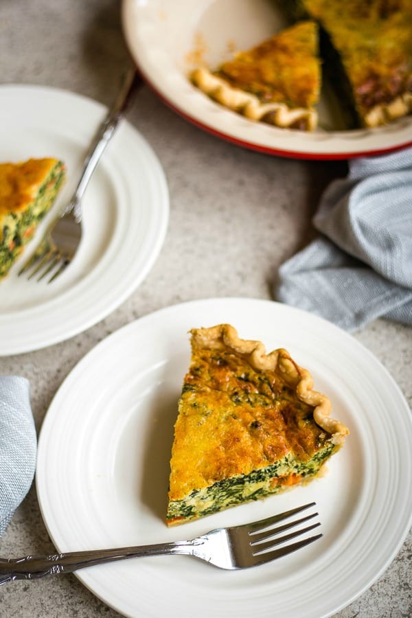 a wedge of spinach quiche