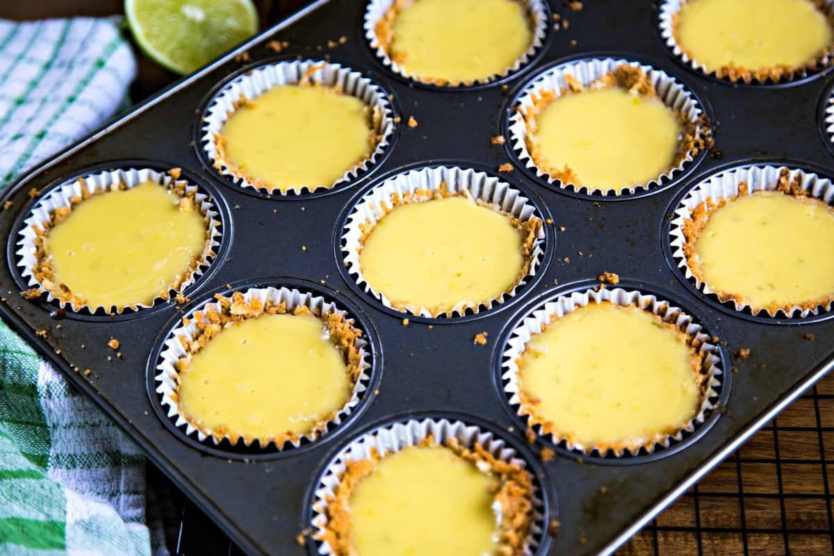 baked key lime pies in a muffin tin