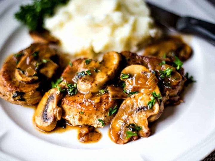 close up of pork medallions in mushroom sauce