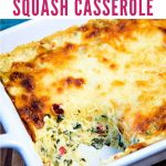 SPINACH SPAGHETTI SQUASH CASSEROLE in a white baking dish on a wooden table.