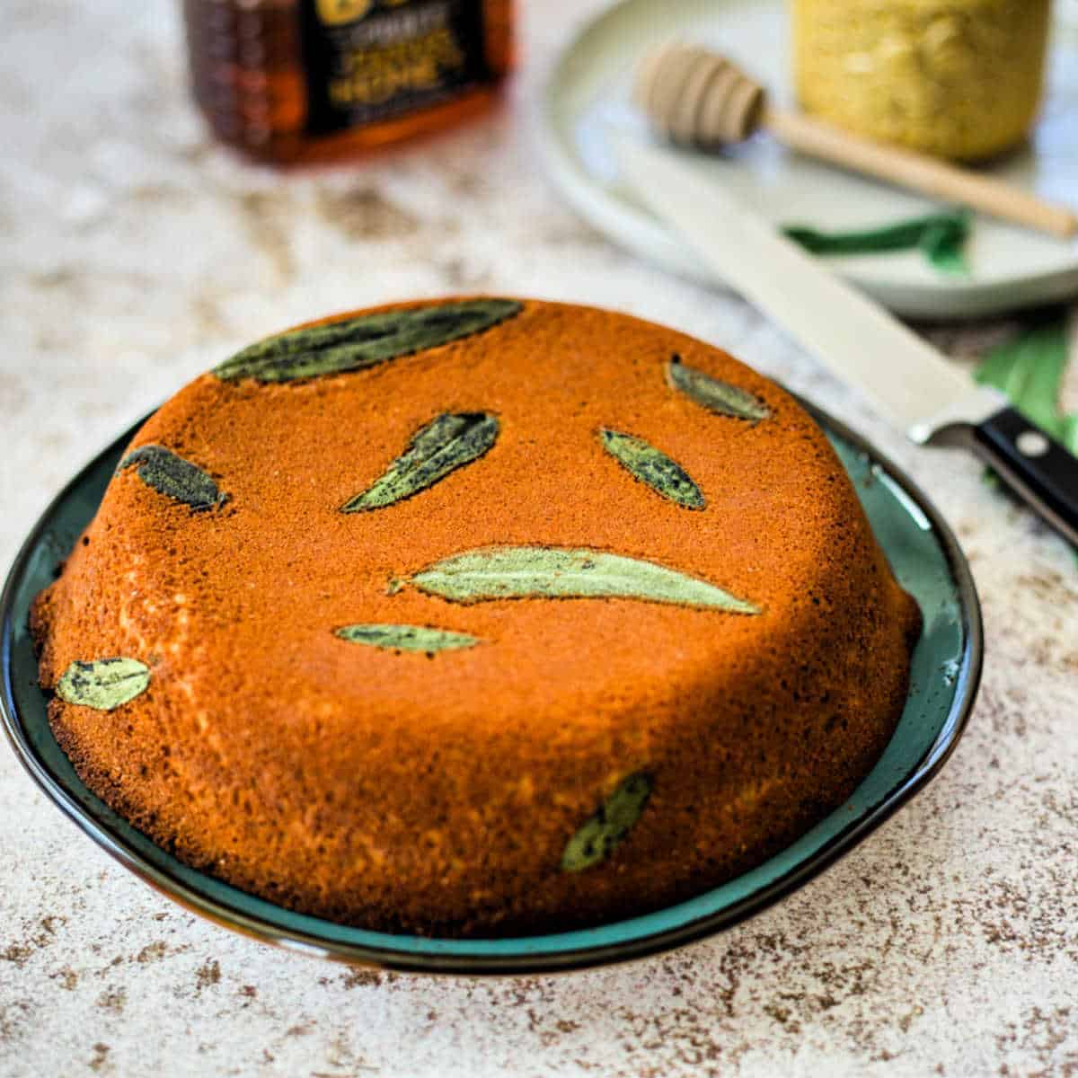 Honey Cornbread with Sage inverted on a blue plate