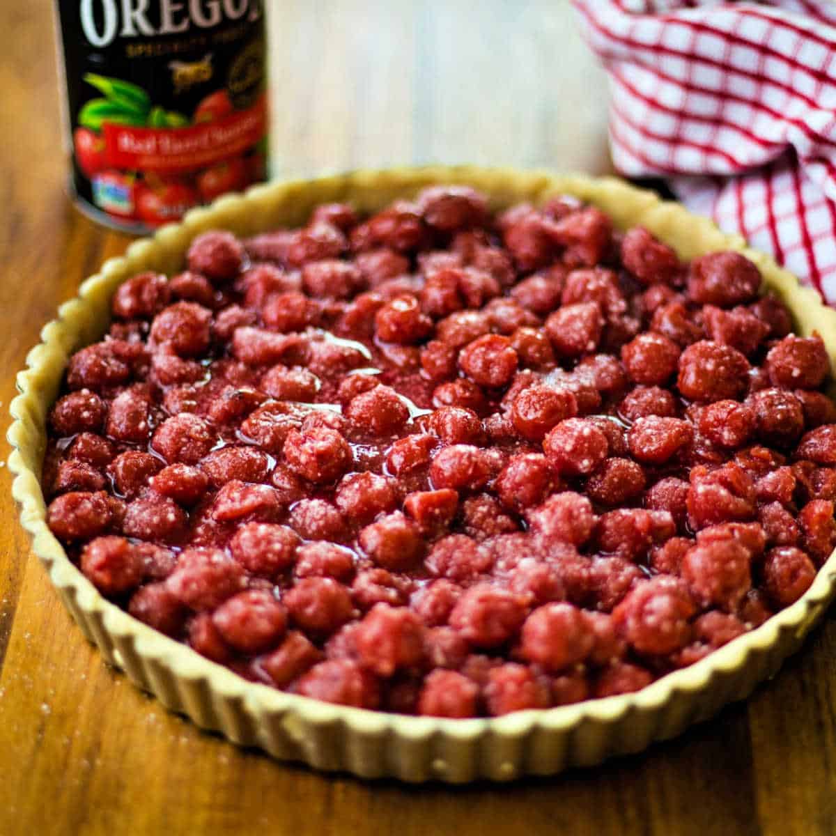 sour cherry tart ready to go in the oven