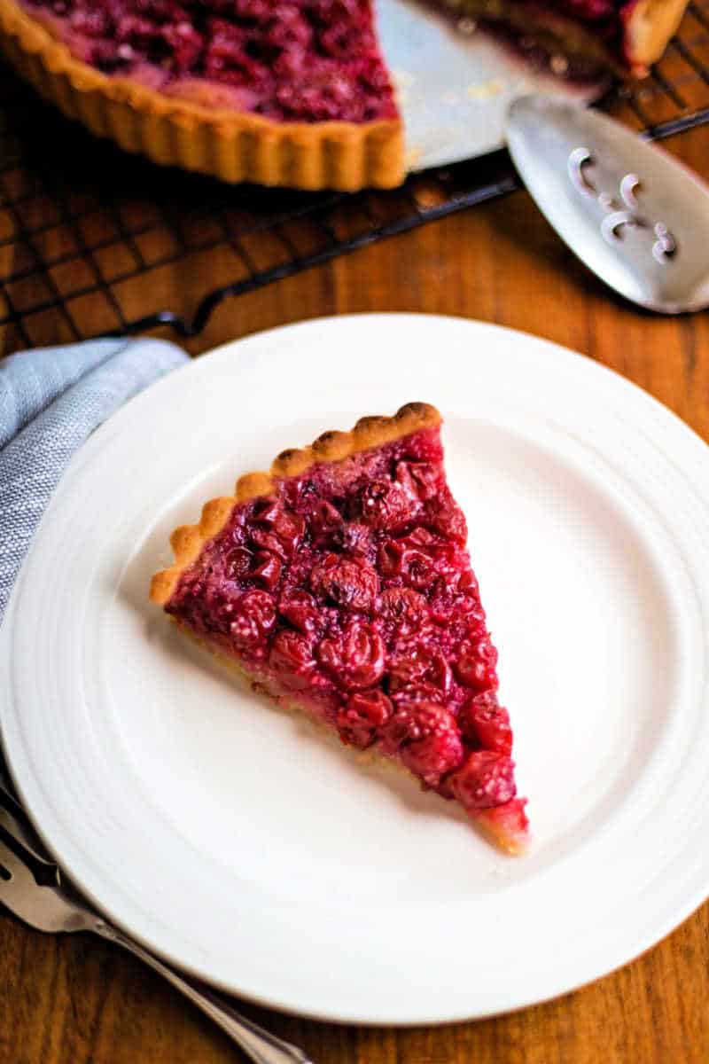 a slice of sour cherry tart