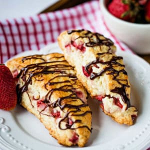 fresh strawberry scones on a white plate