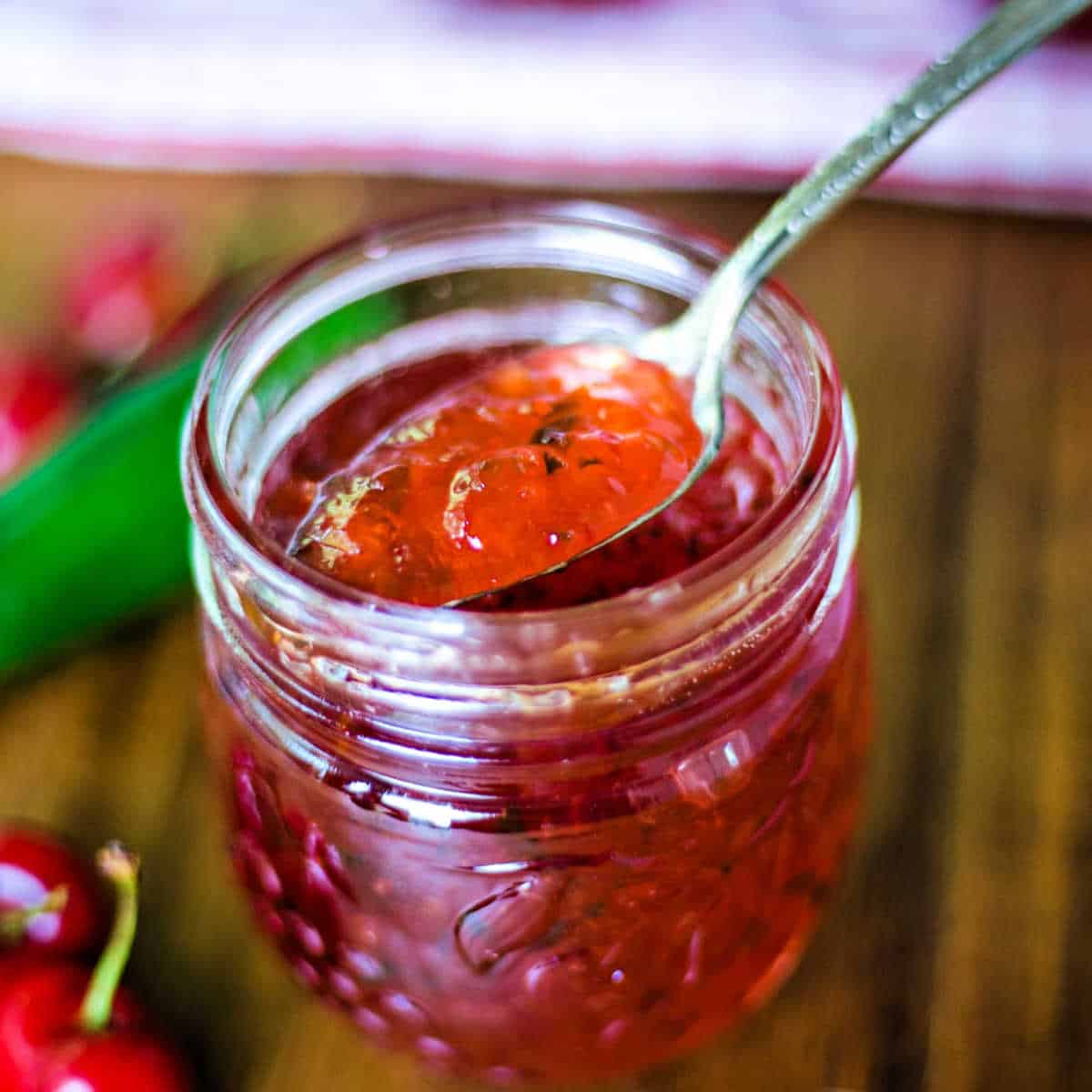 a spoon of hot cherry pepper jelly